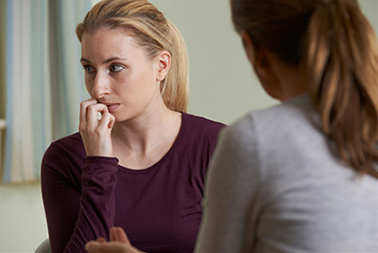 Picture of young woman receiving counselling for panic disorder